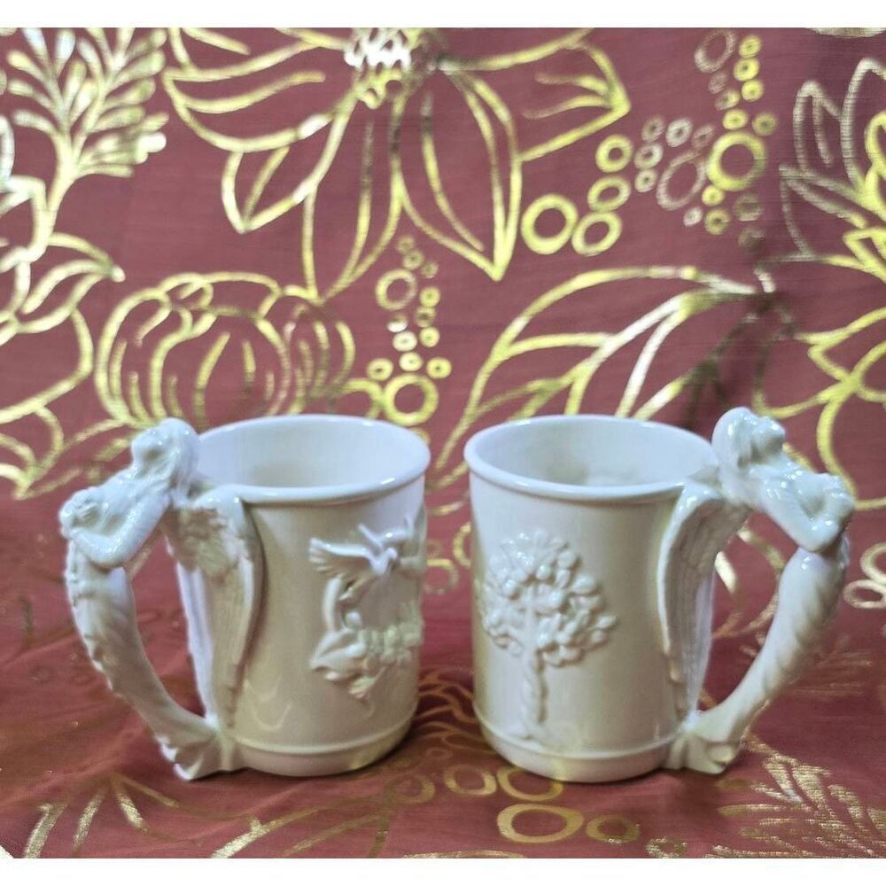 Pair of MCCONNELL TALUS CORP 1994 Collectors Ceramic Mug  w/Angels for the handl